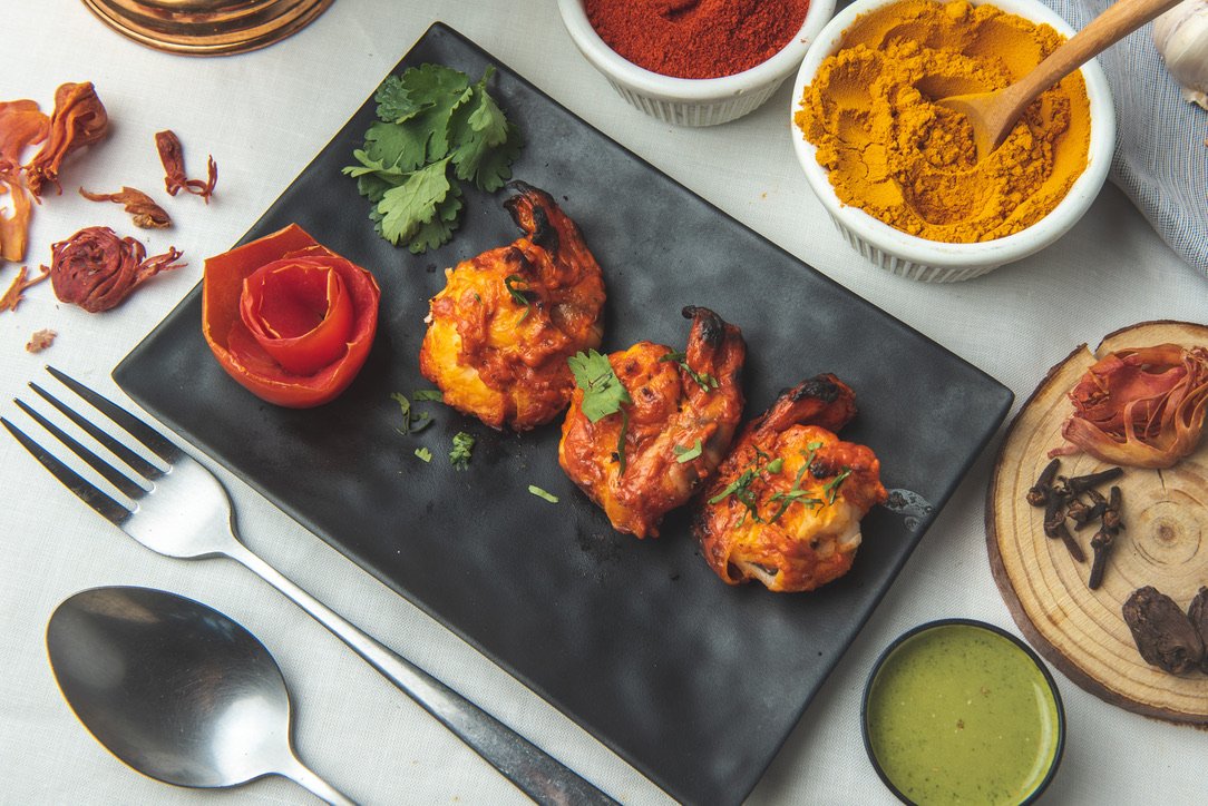 Indian seafood dishes served at beachfront restaurant in Koh Samui